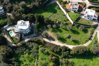 an aerial view of a house and a road at Villa Annatoli in Koskinou