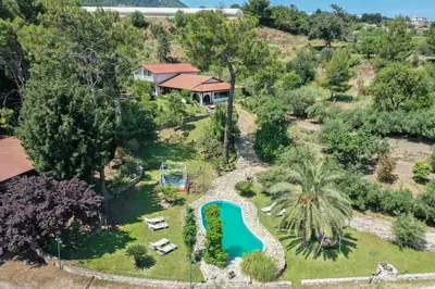 an aerial view of a house with a swimming pool at 4 BD Luxurious villa with swimming pool in Sálakos