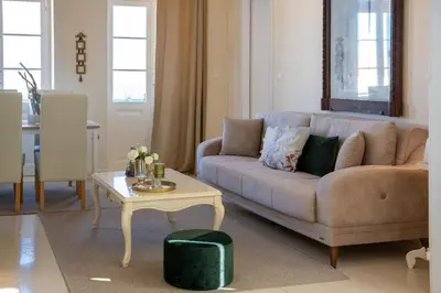 a living room with a couch and a table at 
