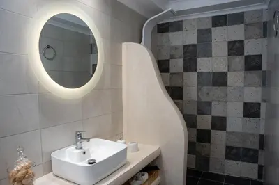 a bathroom with a sink and a mirror at 