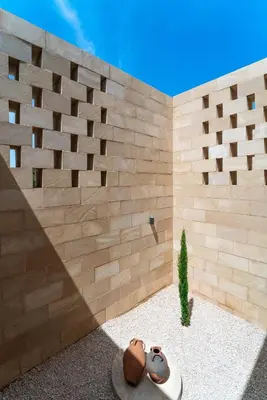 a rendering of a building with a wall at Linear Cabanon Kallithea Luxury Villas in Koskinou