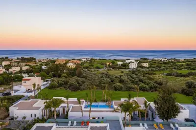 an aerial view of a resort with the ocean at Villa Levanta in Gennadi