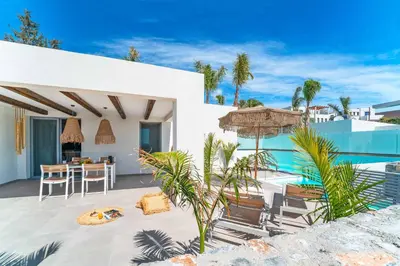 a villa with a swimming pool and a house at Villa Levanta in Gennadi