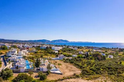 an aerial view of a city and the ocean at Villa Iviskus in Gennadi