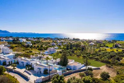 an aerial view of a resort near the ocean at Villa Paparouna in Gennadi