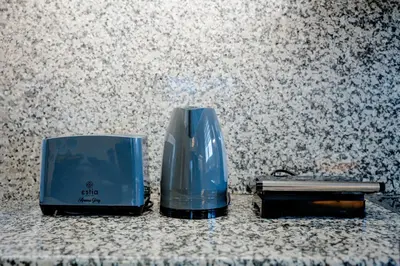 two toasters sitting on top of a counter at Katerina Apartment in Afantou