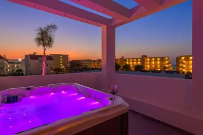 a hot tub on a balcony with a view at Villa Filia in Ialyssos