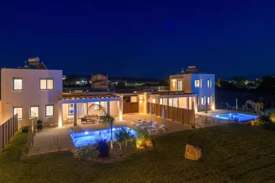 an image of a house at night at Villa Panaxia Votsalo in Theologos