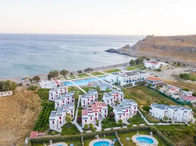 an aerial view of a resort next to the ocean at Kamari Beach in Lardos