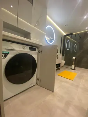 a kitchen with a washing machine in a room at 400 Steps Apartment in Rhodes Town