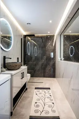 a bathroom with a shower and a toilet and a sink at 400 Steps Apartment in Rhodes Town