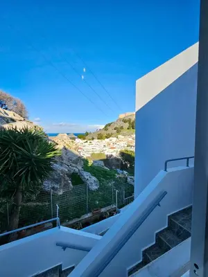 a view from the balcony of a house at Lindos Tsambika Studios in Líndos