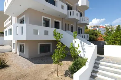 an image of a building with stairs in front at Luxurious and modern house near town and beach in Asgourou