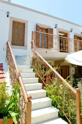 a set of stairs leading to a house at Villa Magdalini in Halki