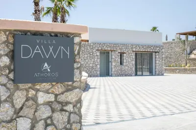 a sign for the villa dawn at hives at Athoros Luxury Villas in Afantou