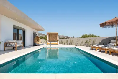 a swimming pool in a villa at Golf Beach Villa in Afantou