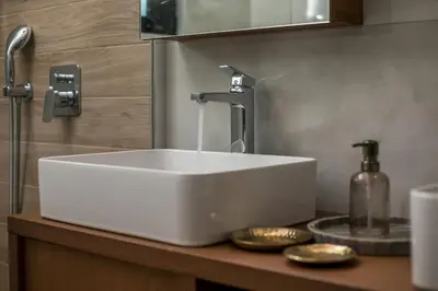 a white sink on a counter in a bathroom at Villa Seranti in Asgourou