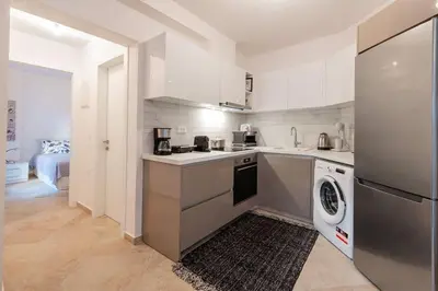 a kitchen with a sink and a dishwasher at Rhodes Center Apartment in Rhodes Town