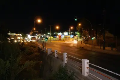 a city street at night with street lights at Aphrodite Apartments in Kallithea Rhodes