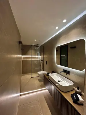 a bathroom with a sink and a shower at Rhode Luxury Villa in Kalithies