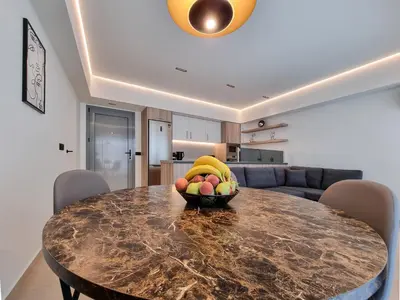 a bowl of fruit on a table in a living room at AKTI city apartment in Rhodes Town