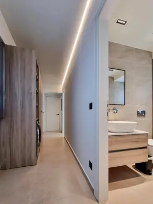 a bathroom with a sink and a mirror at AKTI city apartment in Rhodes Town