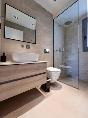 a bathroom with a sink and a toilet at AKTI city apartment in Rhodes Town