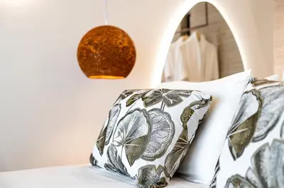 a bedroom with two pillows on a bed at Sirin Luxury Suites Groundfloor in Haraki