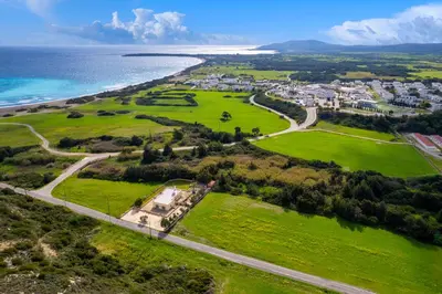 an aerial view of a park next to the ocean at Hermes' Getaway Plimmiri in Plimmiri