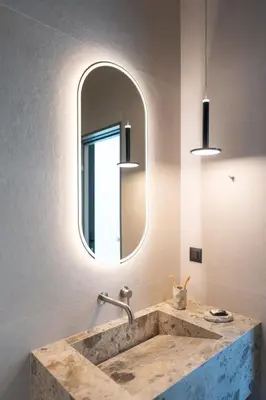 a bathroom with a sink and a mirror at Atria luxury experience in Kattavía