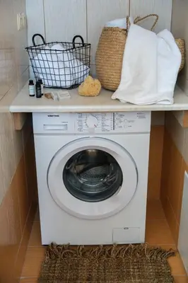 a washing machine with a shelf on top of it at Ismini Luxury Villa in vlicha