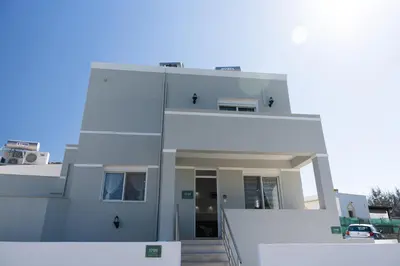 a modern house with a white facade at Ismini Luxury Villa in vlicha