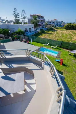 a skate park with a slide and a pool at Coral Paradise Luxury Modern Family Villa with Jacuzzi, Pool View & Parking in Rhodes Island in Kremasti