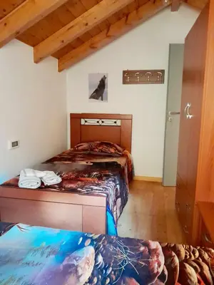 a bedroom with two beds in a room at 