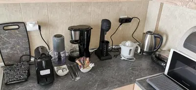 a counter top with a bunch of appliances on it at GIANNIS HOUSE in Rhodes Town