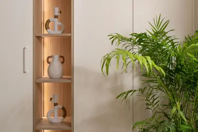 a wooden shelf with a vase and a plant at HELENA’S RETREAT in Rhodes Town