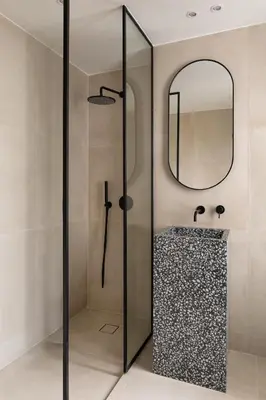 a shower with a glass door and a mirror at HELENA’S RETREAT in Rhodes Town
