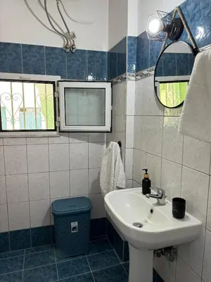 a bathroom with a sink and a mirror at Aesthetic Cozy Haven in Kremasti