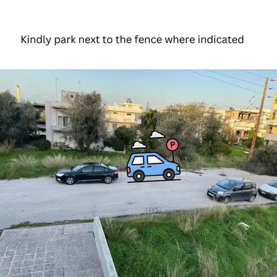 a picture of cars parked in a parking lot at Calm Haven 2024 in Ialyssos