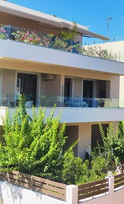 a building with plants in front of it at Villa Marina, apartment Hara, Rodos in Ixia