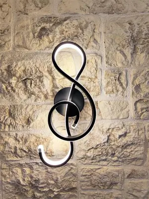 a metal sign hanging on a brick wall at Villa Marina, apartment Hara, Rodos in Ixia