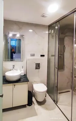 a bathroom with a toilet and a sink and a shower at Villa Marina, apartment Hara, Rodos in Ixia