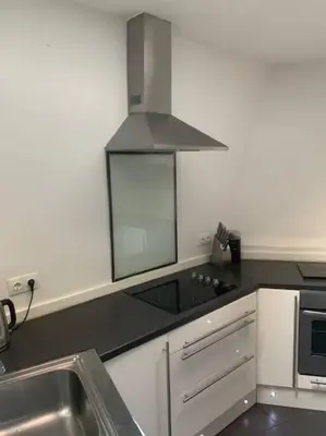 a kitchen with a sink and a stove top oven at Laokoontos 16 in Rhodes Town