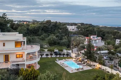 an aerial view of a house with a swimming pool at Luxury Villa Amaltheia Rhodes in Koskinou