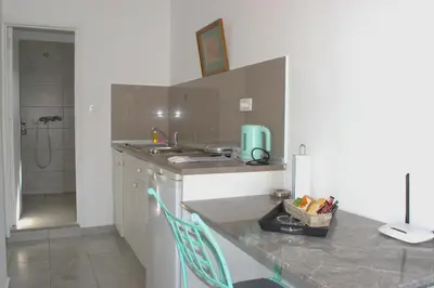 a kitchen with a sink and a counter top at Marea Studios in Symi