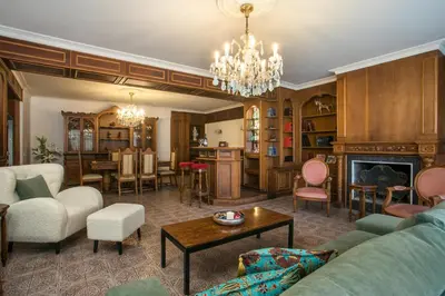 a living room with a couch and a table at Luciana City Apartment in Rhodes Town