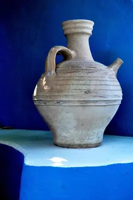 a large white vase sitting on a table at TheDreamHouse ChlorineFree Heated pool Artvillage in Koskinou