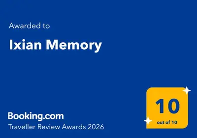 a yellow box with the text awarded to kxian memory at Ixian Memory in Triánta