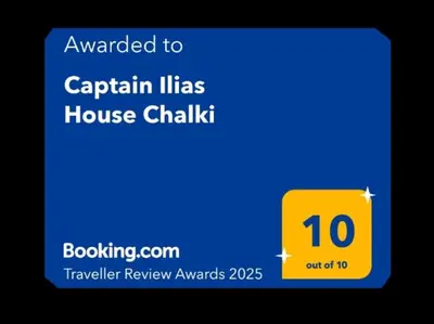a blue and yellow sign that says carahlin lifts house challenge at Captain Ilias House Chalki in Halki