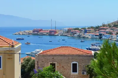 a view of a harbor with boats in the water at Captain Ilias House Chalki in Halki
